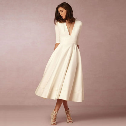 Women's Elegant Solid V-Neck Flowing Flared Midi Dress